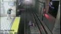 Tube train nearly hits woman